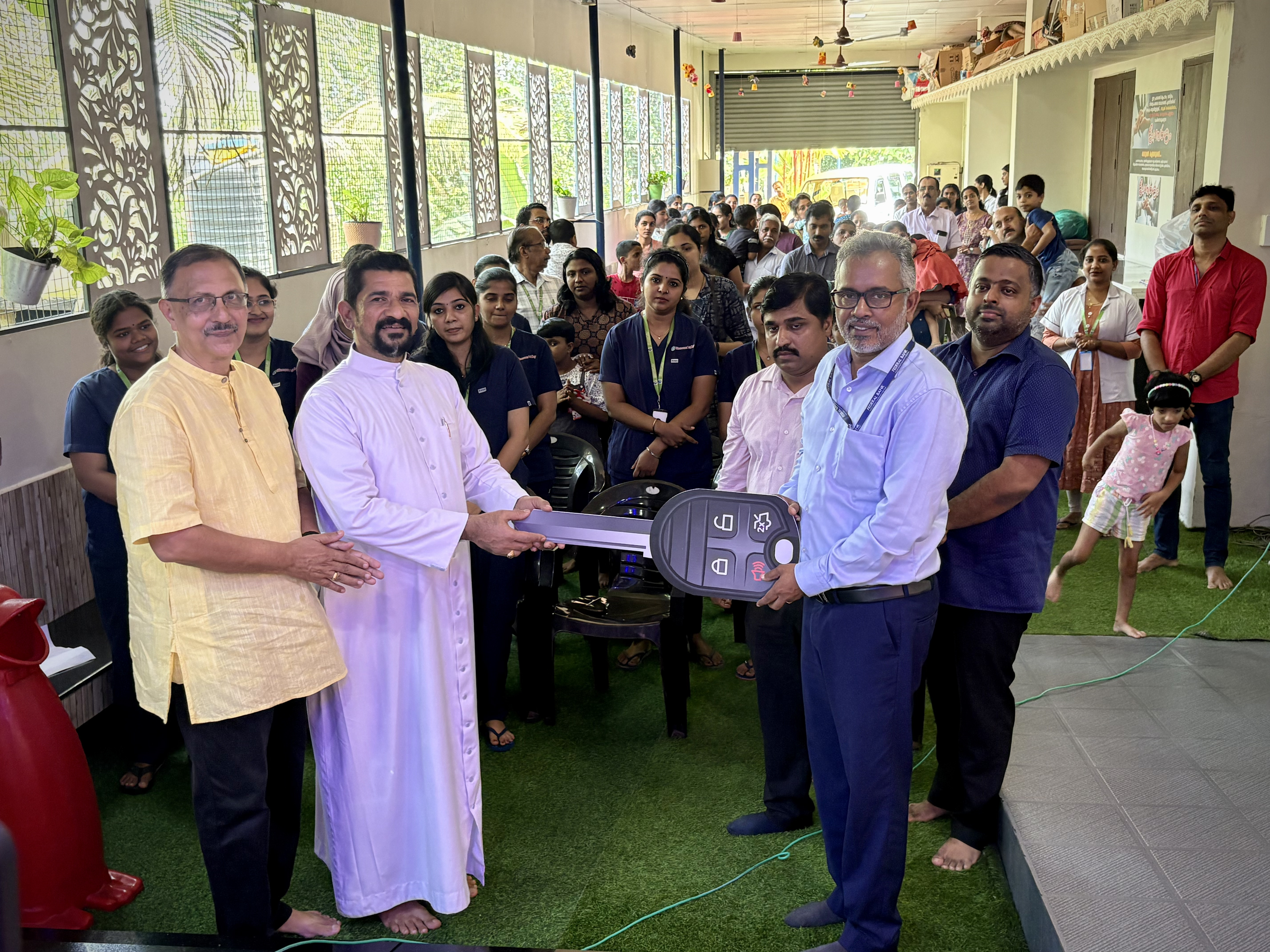 Federal Bank representative being honoured